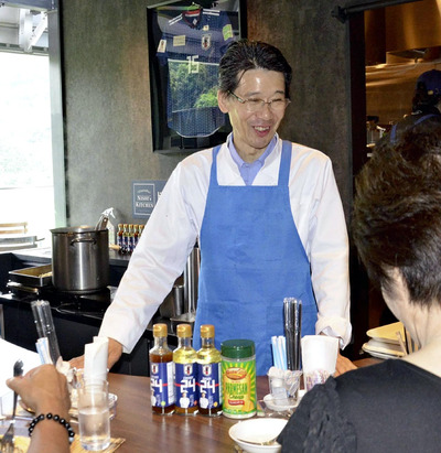 いわきＦＣパークで厨房に立つ私。これからも福島の食の魅力を発信していく