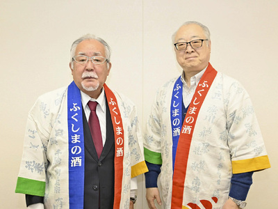 イベント開催をPRする小河日出男代表理事（左）と事務局の菅野新也さん